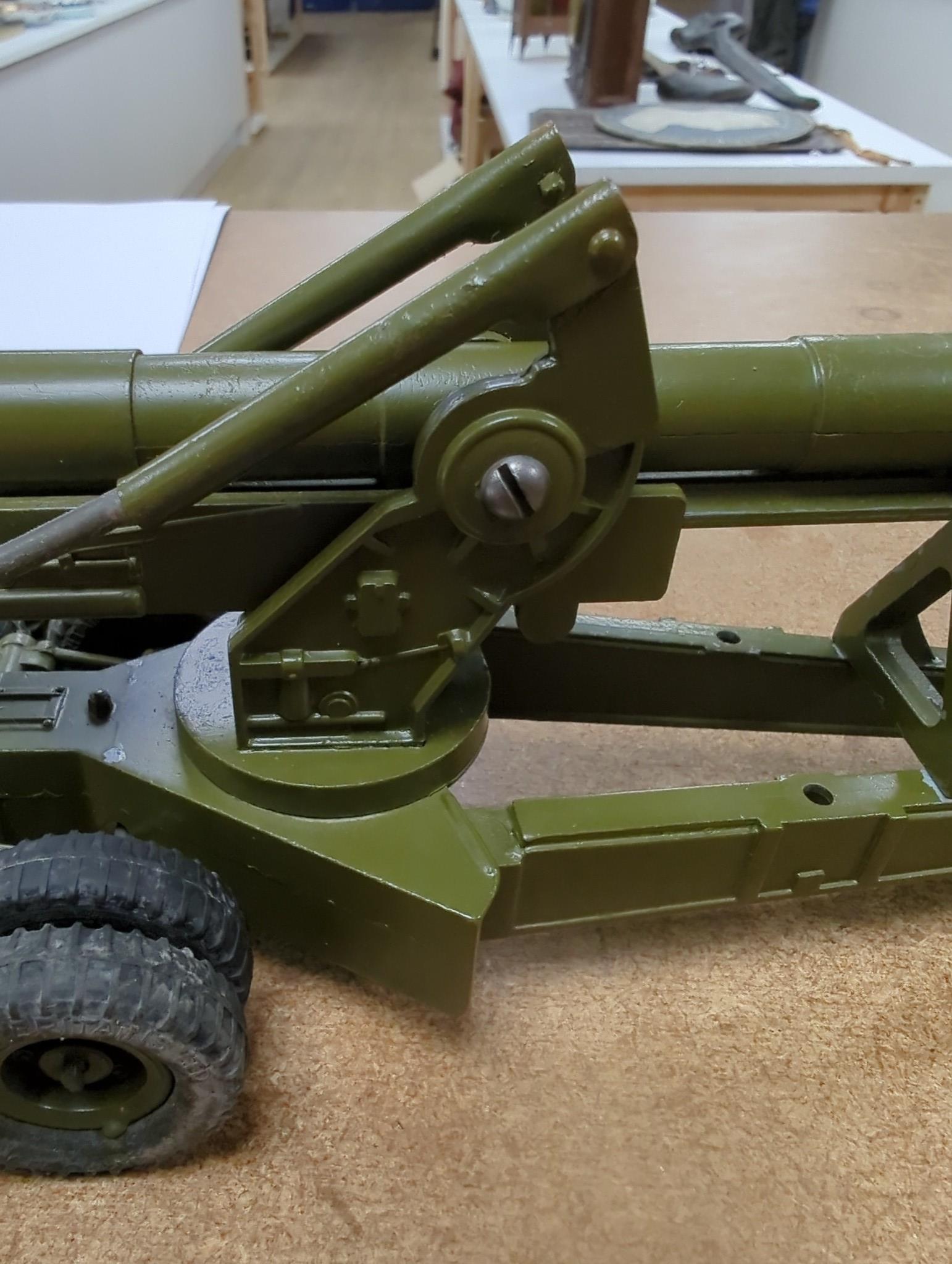 A selection of various Dinky military toys and a boxed Britains 155mm gun